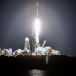 SpaceX rocket Falcon 9 rocket capsule soars upward after lifting off from launch pad. Digitally enhanced. Elements of this image furnished by NASA.