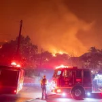 Firefighters battle the Eaton fire as its burns in Sierra Madre^ east side of Los Angeles^ California^ Wednesday^ Jan. 8^ 2025..