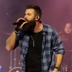 Jordan Davis performs at CMT's RAMJAM on June 3^ 2019 at TopGolf in Nashville^ Tennessee.