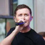 Scotty McCreery performs onstage at Fox and Friends' All-American Summer Concert Series at 48th Street and 6th Avenue on July 31^ 2015 in New York City.