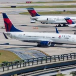 Boeing 737 and 757 Delta parked on Orlando International Airport on September 4^ 2012