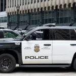 Minneapolis Police car in downtown Minneapolis^ Minnesota^ MN USA^ May 5^ 2023.