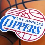 Los Angeles Clippers basketball team badge lies on basketball balls background banner
