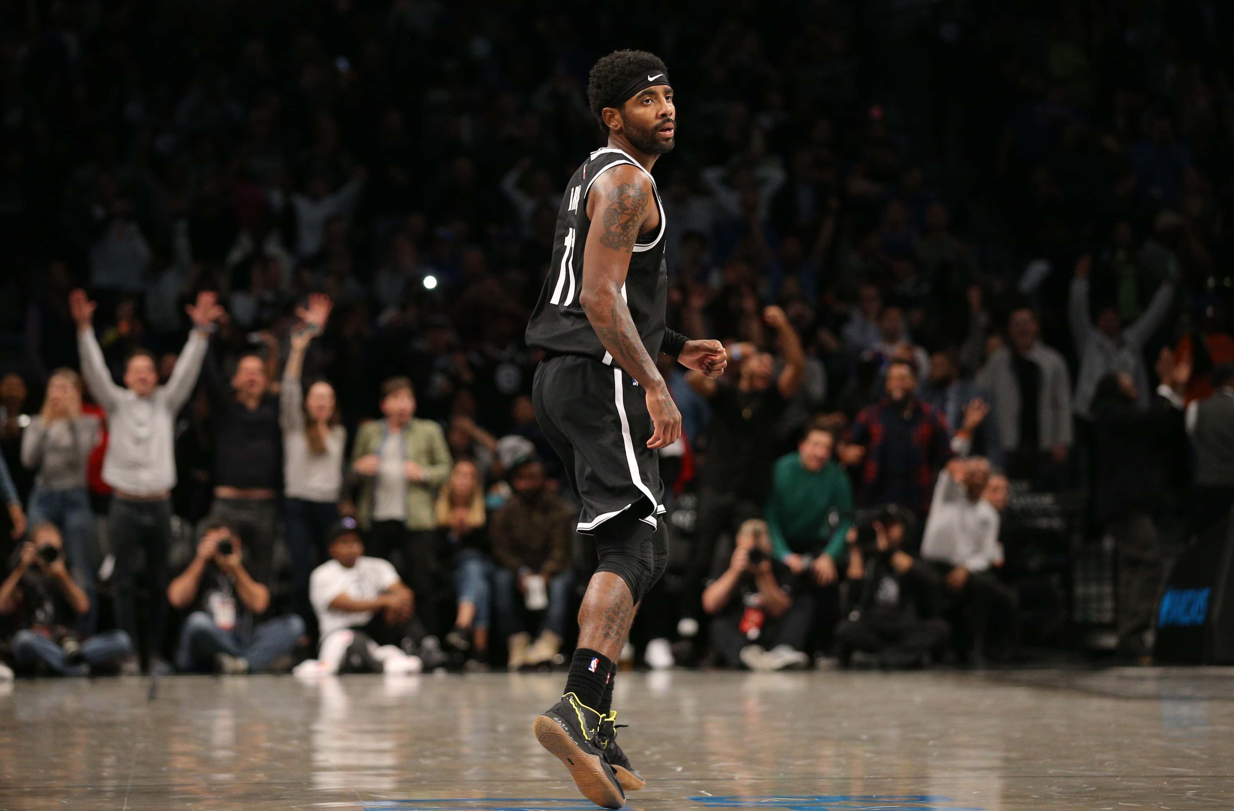 Oct 25, 2019; Brooklyn, NY, USA; Brooklyn Nets point guard Kyrie Irving (11) reacts after making the game winning shot against the New York Knicks during the fourth quarter at Barclays Center. Mandatory Credit: Brad Penner-USA TODAY Sports