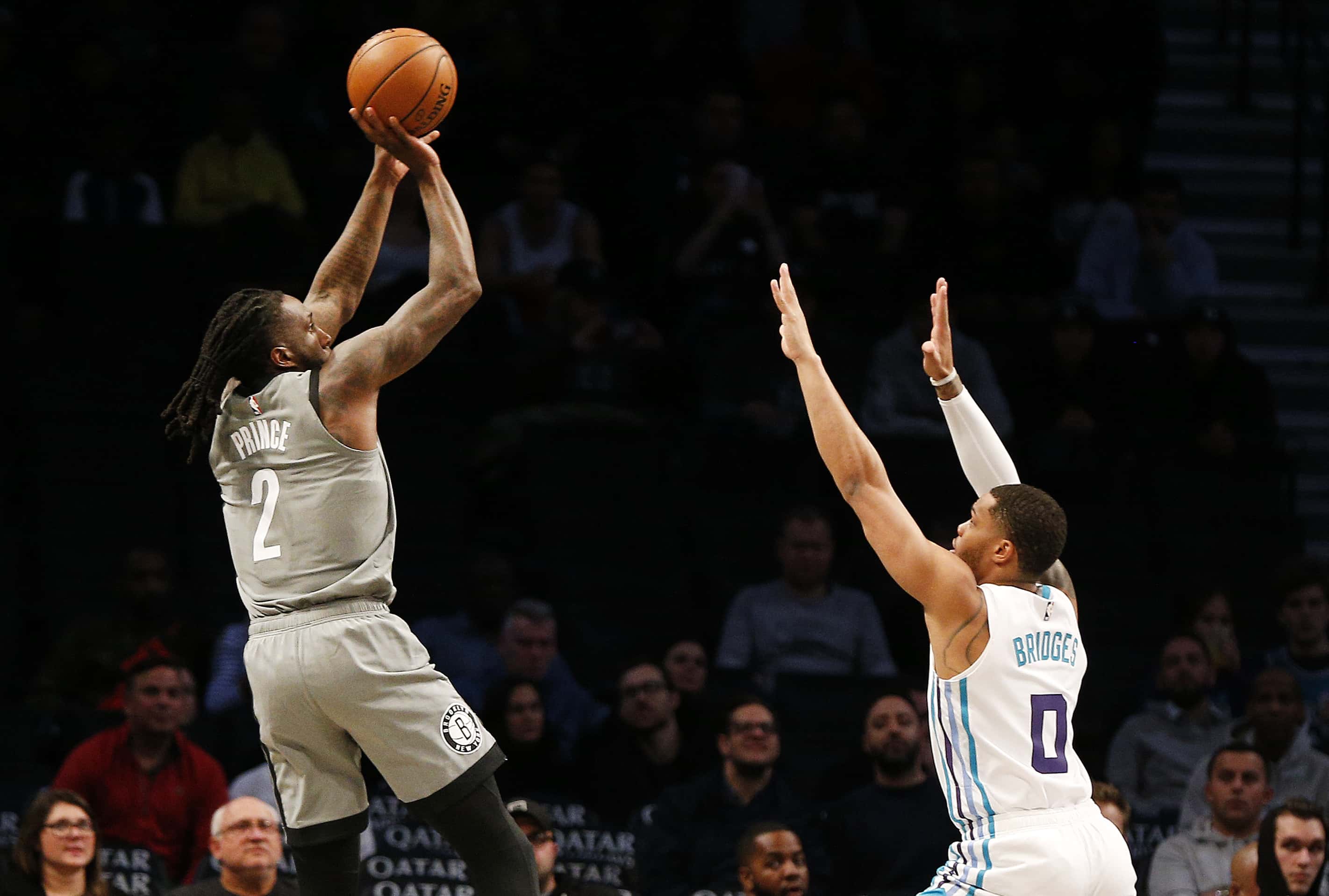 Nov 20, 2019; Brooklyn, NY, USA; Brooklyn Nets forward Taurean Prince (2) shoots while being defended by Charlotte Hornets forward Miles Bridges (0) during the first half at Barclays Center. Mandatory Credit: Andy Marlin-USA TODAY Sports