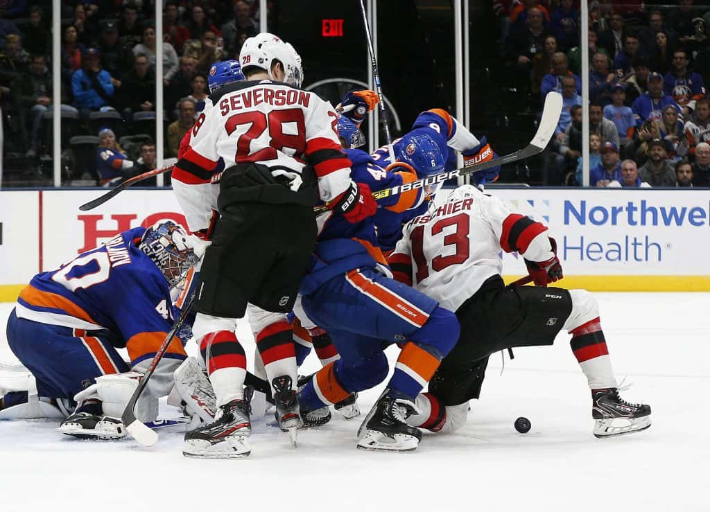 Jan 2, 2020; Brooklyn, New York, USA; New York Islanders goaltender Semyon Varlamov (40) defends his net against the New Jersey Devils during the third period at Barclays Center. Mandatory Credit: Andy Marlin-USA TODAY Sports