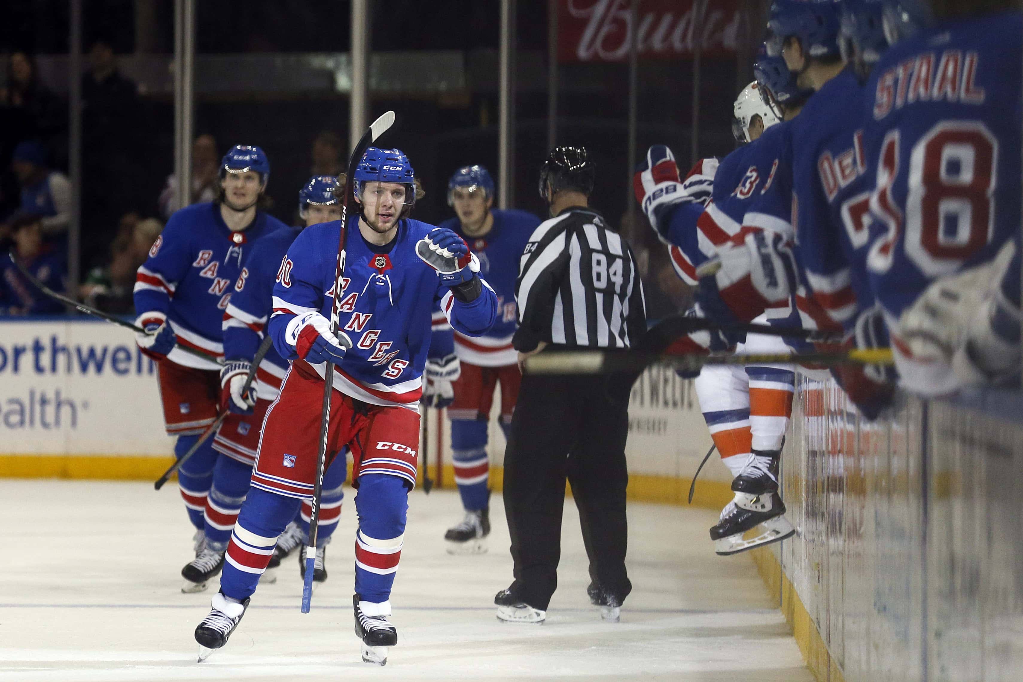 Jan 13, 2020; New York, New York, USA; New York Rangers left wing Artemi Panarin (10) celebrates with teammates after scoring a goal during the third period against the New York Islanders at Madison Square Garden. Mandatory Credit: Adam Hunger-USA TODAY Sports