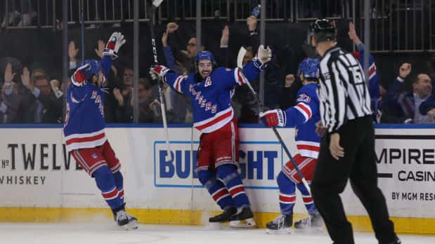 Mar 5, 2020; New York, New York, USA; New York Rangers center Mika Zibanejad (93) celebrates his fourth goal of the game against the Washington Capitals with teammates during the third period at Madison Square Garden. Mandatory Credit: Brad Penner-USA TODAY Sports