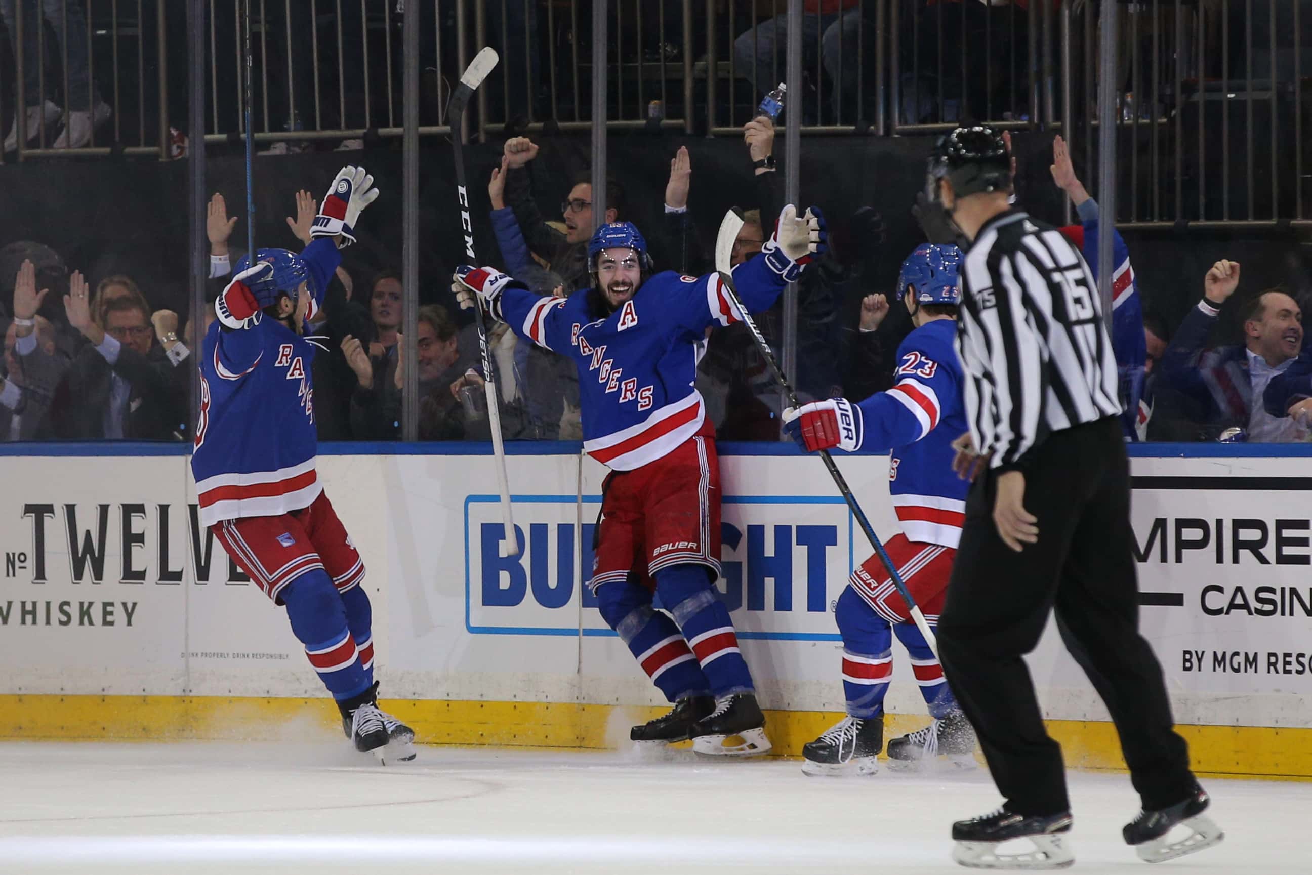 Mar 5, 2020; New York, New York, USA; New York Rangers center Mika Zibanejad (93) celebrates his fourth goal of the game against the Washington Capitals with teammates during the third period at Madison Square Garden. Mandatory Credit: Brad Penner-USA TODAY Sports