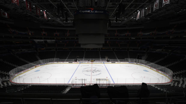 The Capital One Arena, home of the Washington Capitals NHL hockey club, sits empty Thursday, March 12, 2020, in Washington. The NHL is following the NBA’s lead and suspending its season amid the coronavirus outbreak, the league announced Thursday. (AP Photo/Nick Wass)