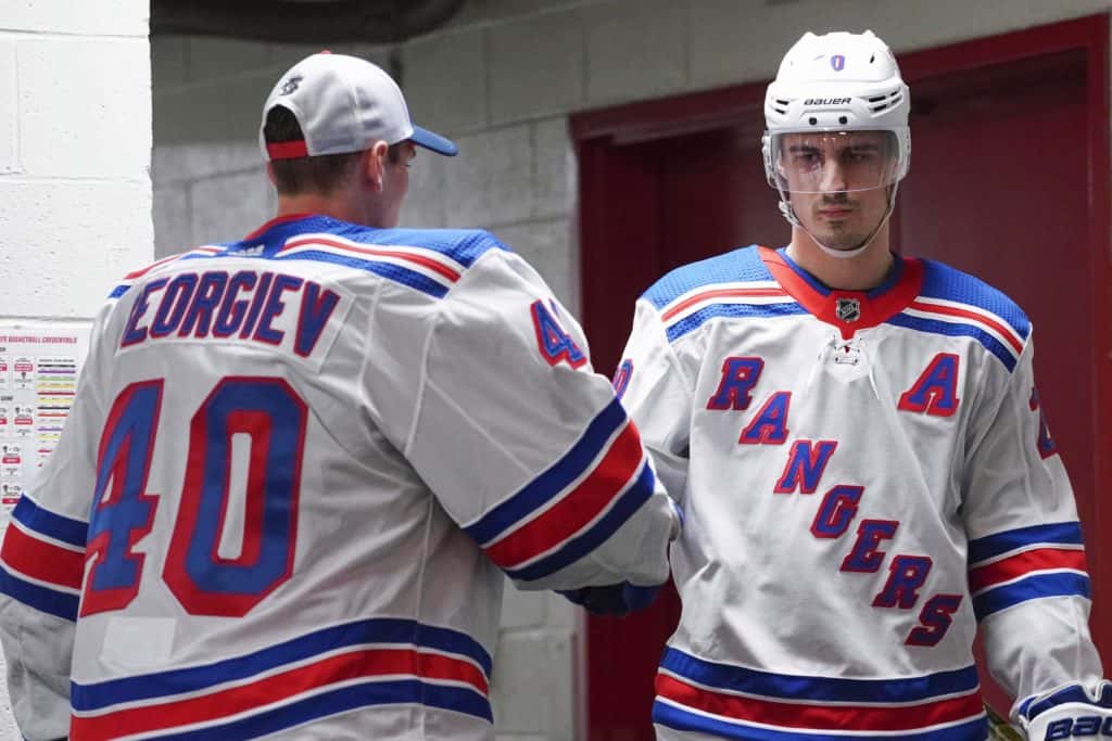Feb 21, 2020; Raleigh, North Carolina, USA; New York Rangers left wing Chris Kreider (20) comes out of the locker room past goaltender Alexandar Georgiev (40) against the Carolina Hurricanes at PNC Arena. The New York Rangers defeated the Carolina Hurricanes 5-2. Mandatory Credit: James Guillory-USA TODAY Sports