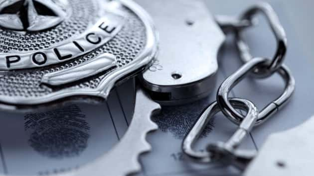 istock_81519_policebadgecuffs