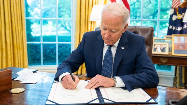 wh_121322_bidensigning