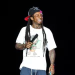 Lil Wayne performs in concert as part of his 2013 America's Most Wanted Tour on July 27^ 2013 in Raleigh^ NC.