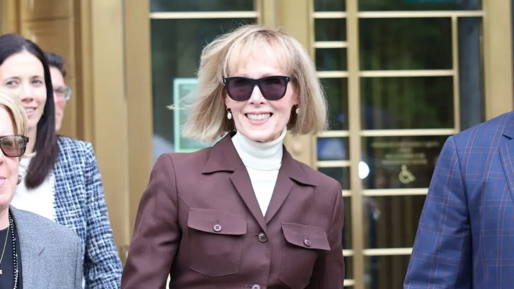 E. Jean Carroll smiles as she leaves the courtroom after a jury found former President Trump liable for sexual abuse and defamation. New York^ NY USA - May 9 2023