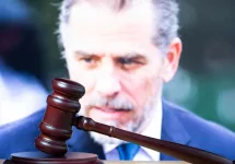 Hunter Biden ^court session. Judicial Hammer on the background of the photo.