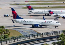 Boeing 737 and 757 Delta parked on Orlando International Airport on September 4^ 2012