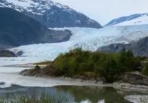 Tourist visiting Mendenhall Glacier. Juneau. Alaska.