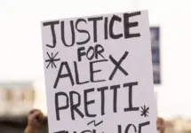 People protest the ICE killing of Alex Pretti in front of the downtown Federal Building. Los Angeles^ California^ USA - January 25^ 2026