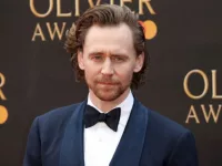 Tom Hiddleston attends The Olivier Awards at the Royal Albert Hall in London^ England. London^ United Kingdom - April 7^ 2019