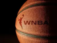 Closeup of a basketball with the WNBA logo and text Raleigh^ NC - USA - 06-13-2024