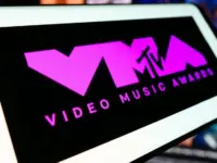 Mobile phone with logo of award show MTV Video Music Awards (VMA) in front of website. Focus on center-left of phone display. Stuttgart^ Germany - 03-19-2024