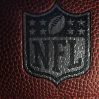 Closeup of an NFL logo on an American football