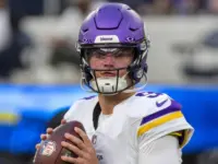 Minnesota Vikings quarterback J.J. McCarthy #9 warms up prior to an NFL football game against the Los Angeles Chargers Oct. 23^ 2025^ in Inglewood^ Calif.