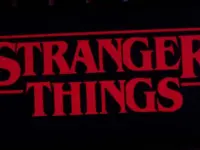 Iphone 11 pro with the Stranger Things logo on top of a computer keyboard. United States^ New York. Sunday^ September 29^ 2019.