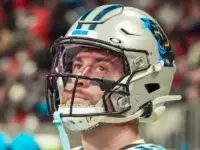 Carolina Panthers wide receiver Adam Thielen (19) on the sidelines against the Atlanta Falcons on January 5^ 2025 at Mercedes-Benz Stadium.