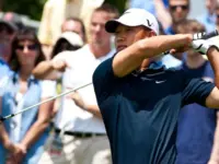 Golfer Anthony Kim tees off on the first tee while participating in the Travelers Championship on the TPC River Highland Golf Course June 27^ 2009 in Cromwell^ CT.
