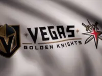 Waving flag with Vegas Golden Knights NHL hockey team logo. Close-up of waving flag with Vegas Golden Knights NHL hockey team logo^ seamless loop. Editorial footage