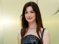 Anne Hathaway at the Versace FW23 Show at the Pacific Design Center on March 9^ 2023 in West Hollywood^ CA