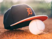 Baseball ball with Detroit Tigers cap on pitchers mound. BELGRADE^ SERBIA - APRIL 12^ 2017