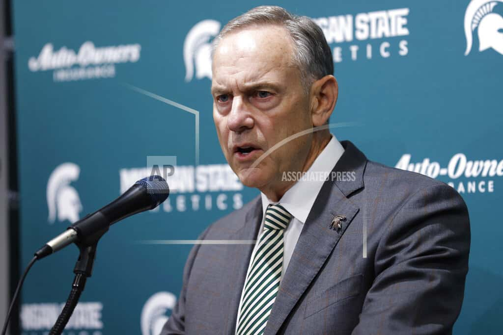 michigan-st-dantonio-retires-football