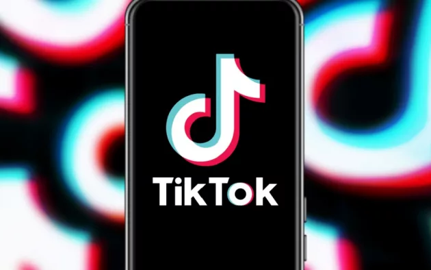 Smart phone with TIK TOK logo^ popular social network based in China
