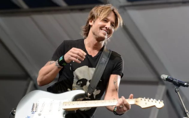 Keith Urban performs at the 2015 New Orleans Jazz and Heritage Festival. New Orleans^ LA - April 24^ 2015