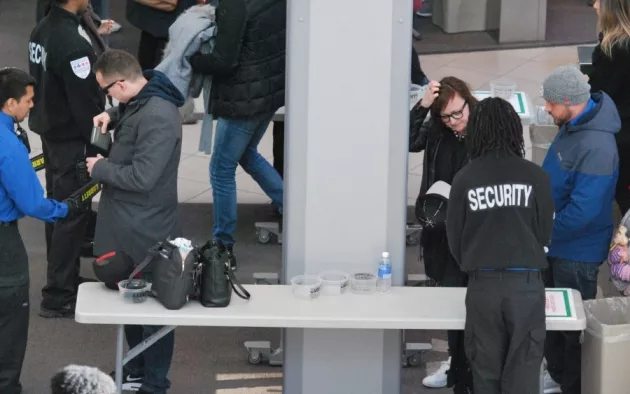 Security Checkpoint and control in Toronto^ Canada - March 24 2018: Scanning Machines^ People's Bags Getting Checked.