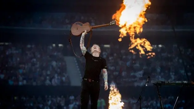getty_edsheeranguitarfire_021926332077