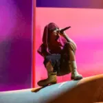 getty_justinbiebercrouchingcoachella_041926844402