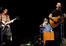 Mike Ness of rock band Social Distortion sings and plays guitar on stage at the Crocodile in Seattle on February 13^ 2011.