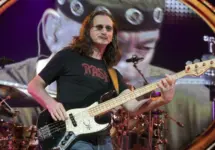 Geddy Lee of the rock band Rush hits the stage for part of their Time Machine Tour at the Gibson Amphitheater in Universal City^ CA on June 22^ 2011.