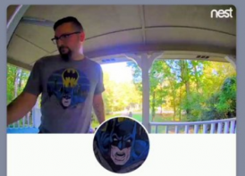 nest cam pic of man with batman shirt