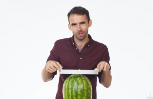 idiot trying to cut a watermelon