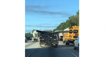 pipe hanging out of truck