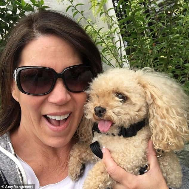 woman with poodle dog