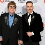 getty_eltonjohnanddavidfurnishviewingparty_030326160860