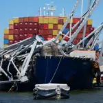 Container vessel Dali is trapped and aground under the wreckage of the Francis Scott Key Bridge in Baltimore. Baltimore^ MD USA - 4-23-2024